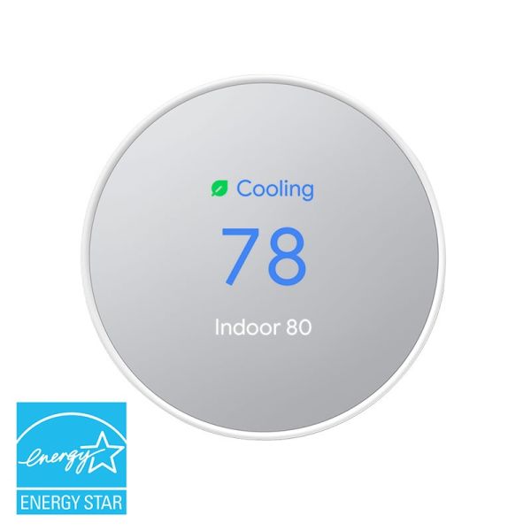 A snow colored Google Nest Thermostat on a white background and a blue EnergyStar logo in the left corner
